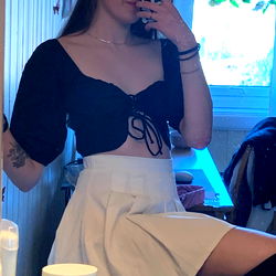 Ari in Chic Attire, Posing in Bathroom