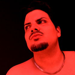 Intense Portrait of a Man in Tattoo-Inspired Lighting