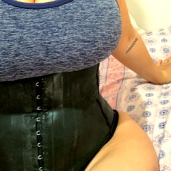 Babyg in Latex Corset