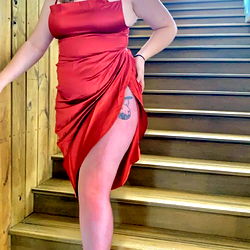 Ram me in a stylish red dress posing for the camera