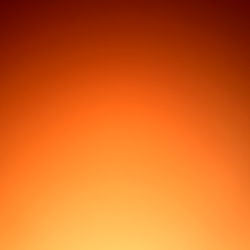 An image with a gradient background that transitions from brown to beige, creating an interesting visual effect.