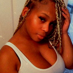 JaleciaIAm's Confident Style with Braided Hair and Bold Makeup