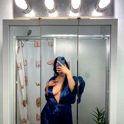 Fashionable Model in Bathrobe Mirror Reflection