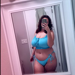 Model Evelyn Lynn in Blue Bikini