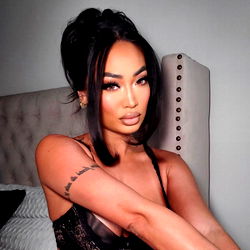 OnlyFans Model Angelina Ang Posed with Tattoo, Bangs and Bangles