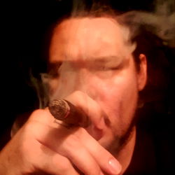 Vigorous Gentleman Smoking Fine Cigar