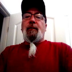 A Man with a Beard and Mustache