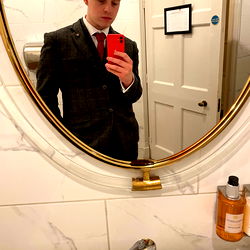 Professional Model Poses in Bathroom Mirror
