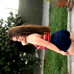 Stylish Onlyfans Model Chloe Lopez Posing in a Colorful Top