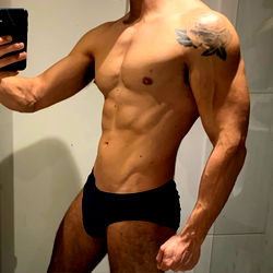 A Fitness Model Posing in Only Underwear,