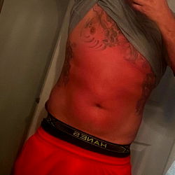 Missouri Ink Artist Showcasing Chest Tattoo