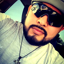 Elninon9, Tattooed Man in Sunglasses with Cross Necklace