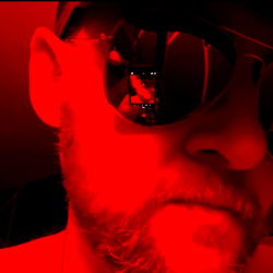 Stylish Actor in Red Sunglasses and Goggles