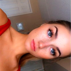 Erica, The Philly Model - Striking a Pose in Her Red Tank Top