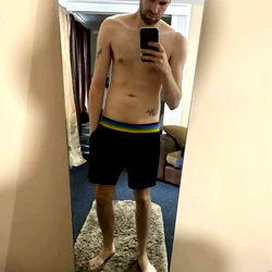 Jonny Rockshot's Full-body Mirror Selfie in Bathroom