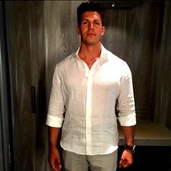 Strongman Model Posed in a Locker Room