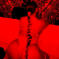 A OnlyFans Model in a Red Swimsuit