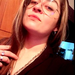 A Woman Smiling at the Camera