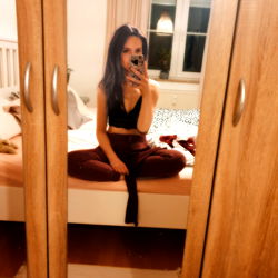 Young Female in Relaxed Pose, Mirror Selfie
