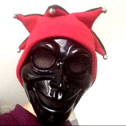 Creepy Clown Mask Wearing Red Hat