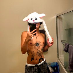 Sexy Saint Pose With Spider-Man Hat and Phone in Bathroom Mirror