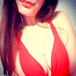 Female Model in Red Swimsuit with Necklace