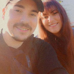 Two people posing for a selfie