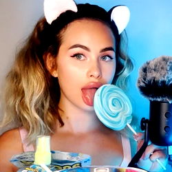 Model Holding Camera with Painted Nails