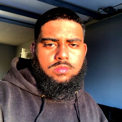 Athletic Young Male with Beard and Short Hair, Posing for the Camera