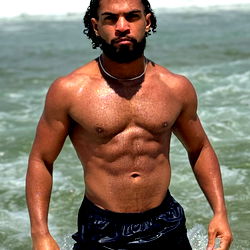 Alenflix, Muscular Man in Swim Trunks by the Ocean