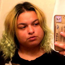 Model Angelina with Blonde Hair and Green Hair Highlights