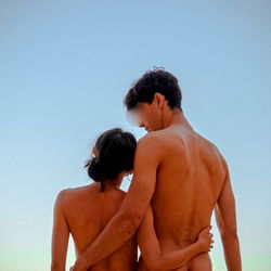 Asya xash | A couple's intimate moment on a sandy beach