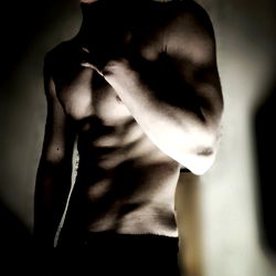 Shirtless Male Model in Fitness Studio