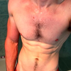 Fit and toned model showcasing his physique