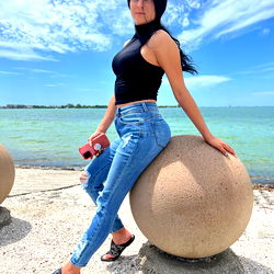 Beautiful model posing at the beach