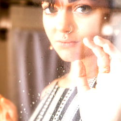 Elise Laurette, Elegantly Peering from a Bathroom Window