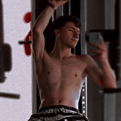 Andrey, a Colombian Fitness Model Posing in the Gym