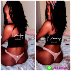 Model in a black tank top and beige underwear