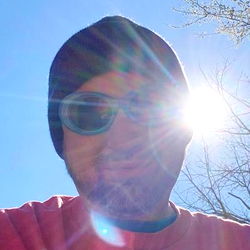 Bald Bryan in a Knit Cap with Sunglasses