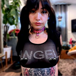 Sofi, a captivating model in a risqué photoshoot