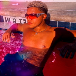 Fashion-forward swimwear photoshoot in resort pool