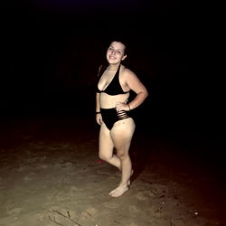 Kait on a Beach at Night