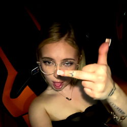 Jade Onlyfans Model in Car, Showing Middle Finger