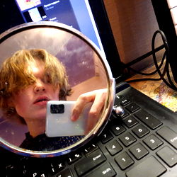 Maria Rainilda in a Mirror Selfie