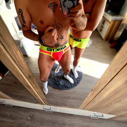 Fit Twins Showing off Their Abs