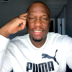 Athlete's Thoughtful Expression at Desk