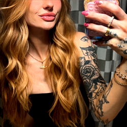 Aesthetic Tattooed Female Taking Selfie