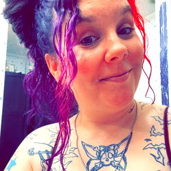 Vividly Colored Tattooed Model in OnlyFans, AZ