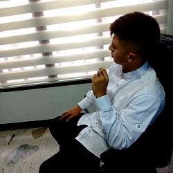 A Young Man in a Business Setting