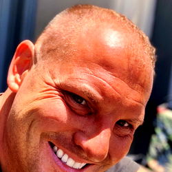 A Smiling Man with Short Hair